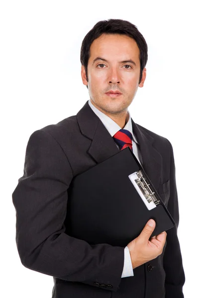 Портрет красивого бизнесмена, стоящего с папкой. Изолат — стоковое фото