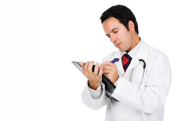 Arzt mit Stethoskop, der Notizen am Notizbuch schreibt. Isol — Stockfoto