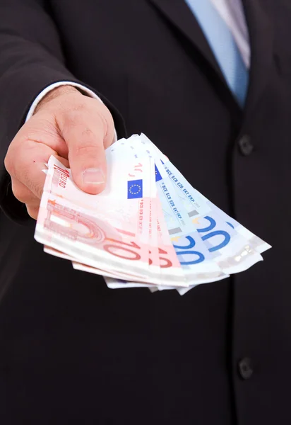 Croped foto van een zakenman aanbieden van geld — Stockfoto