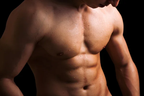 Perfekter nackter männlicher Oberkörper vor schwarzem Hintergrund — Stockfoto