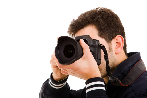 Молодой фотограф с камерой, изолированный на белом — стоковое фото