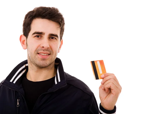 Jovem feliz segurando cartão de crédito, isolado em branco — Fotografia de Stock