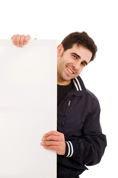 Boş billboard holding gülümseyen genç bir adam portresi — Stok fotoğraf