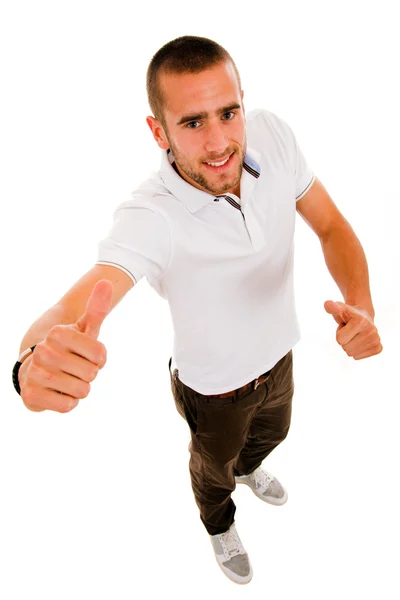 Jovem homem casual polegares para cima em um fundo branco — Fotografia de Stock