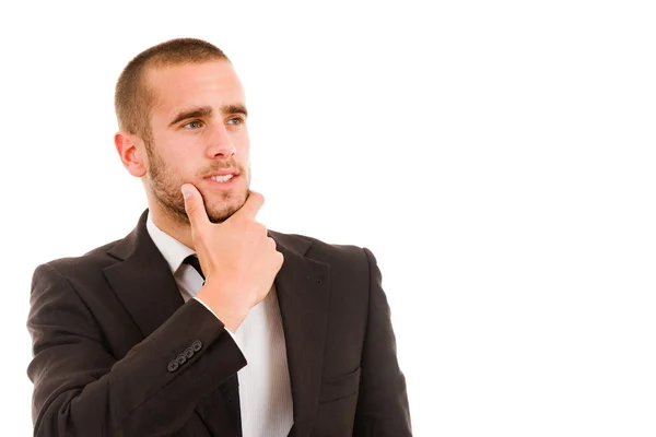 Portrait of a pensive young business man over white background — Stock Photo, Image