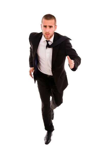 Молодий бізнесмен бігає ізольовано на білому тлі — стокове фото