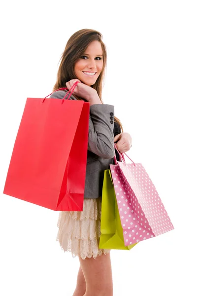 Lovely beautiful young woman with shopping bags, isolated on whi — Stock Photo, Image