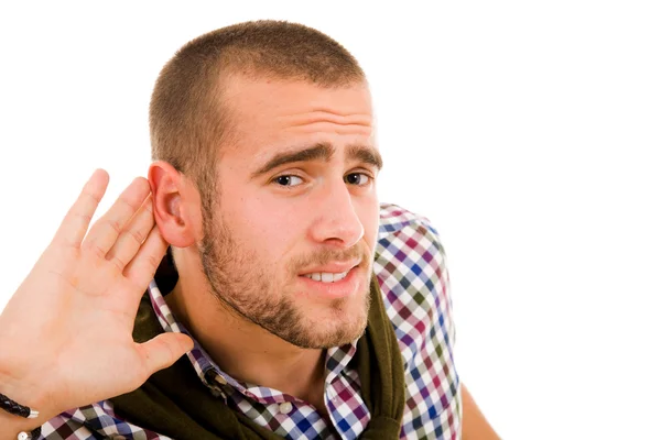 Jonge man het gesprek, geïsoleerd over witte backgr luisteren — Stockfoto