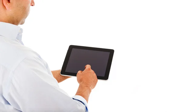 Beau homme utilisant un ordinateur tablette sur un fond blanc — Photo