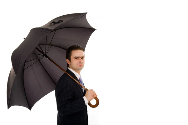 Νεαρός επιχειρηματίας με μια ομπρέλα λευκό φόντο — Φωτογραφία Αρχείου