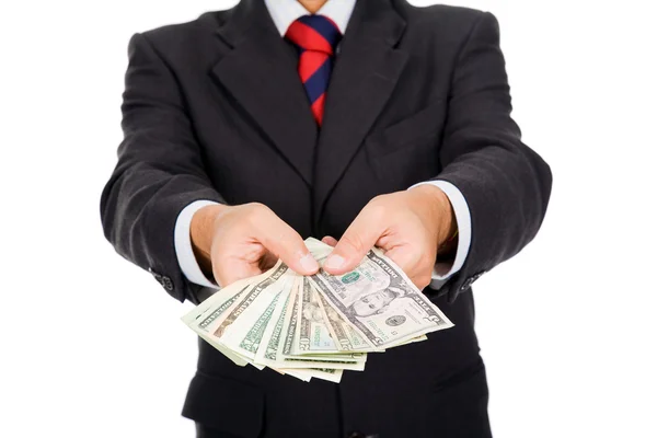 Image of a business man holding money, isolated on white — Stock Photo, Image