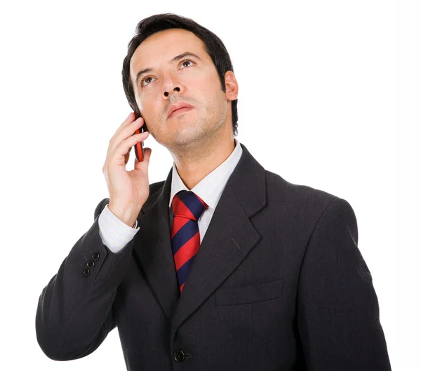 Joven hombre de negocios hablando por teléfono, aislado en blanco —  Fotos de Stock