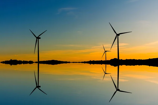 Windmills silhouette on suset background — Stock Photo, Image