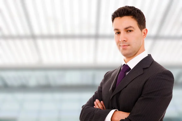 Portrait of a young successful business man at a modern office b — Stock Photo, Image