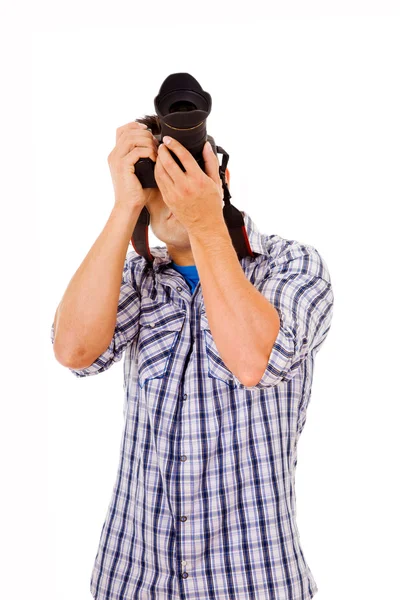 Młody fotograf z aparatu, na białym tle — Zdjęcie stockowe