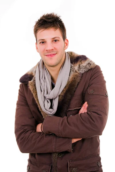 Portret młody człowiek ubrany zimowe ubrania, na w tle — Zdjęcie stockowe