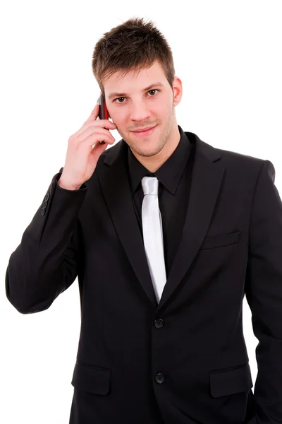Mladý obchodní muž mluví na mobilní telefon, izolované nad whi — Stock fotografie