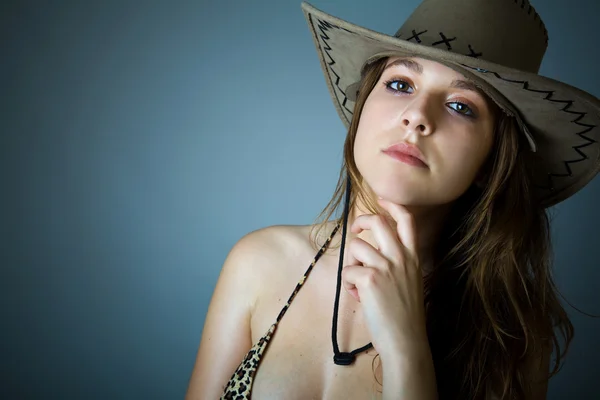 Young sexy woman in cowboy hat. — Stock Photo, Image