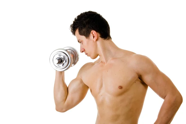 Erős, izmos fiatalember emelő súlyok — Stock Fotó