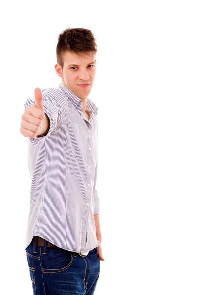 Šťastný mladý muž ukazuje palcem a usmívá se, izolované na bílém — Stock fotografie