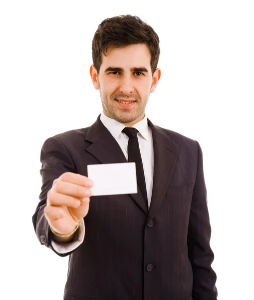 Jovem empresário oferecendo cartão de visita em fundo branco — Fotografia de Stock