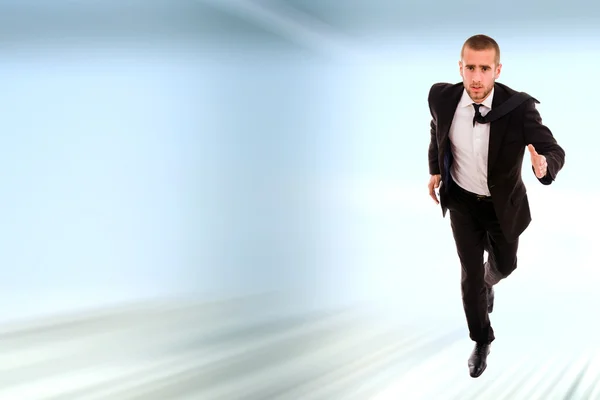Mladý obchodní muž běží — Stock fotografie