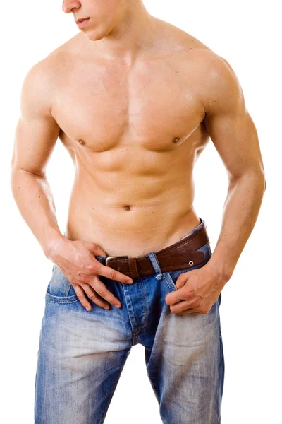 Сексуальный мускулистый мужчина изолирован на белом — стоковое фото