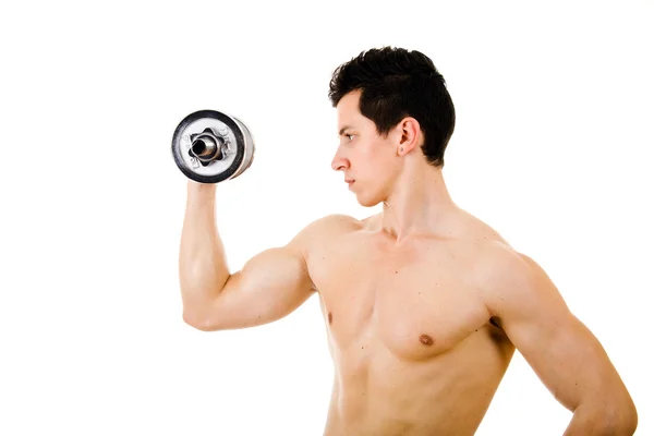 Kräftiger muskulöser junger Mann, der Gewichte stemmt. isoliert auf weiß — Stockfoto