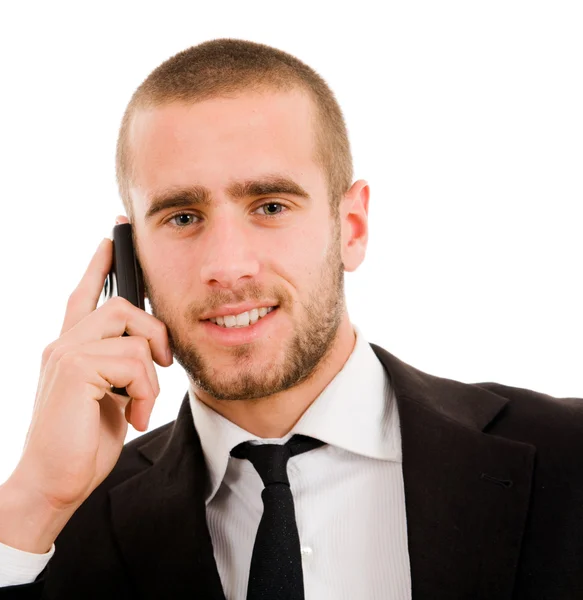 Närbild av ung affärsman som talar i mobiltelefonen, över — Stockfoto