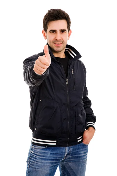 Jovem feliz homem casual polegar em um fundo branco — Fotografia de Stock