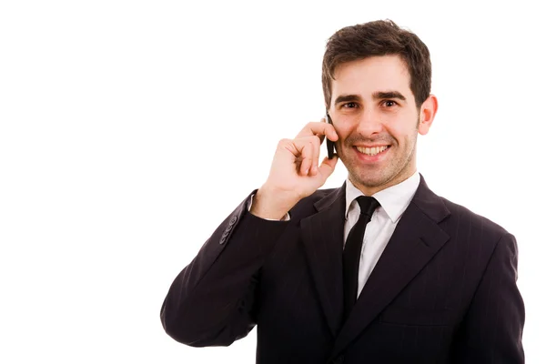 Χαμογελαστός νεαρός επιχειρηματίας στο τηλέφωνο, να απομονωθεί σε λευκό — Φωτογραφία Αρχείου