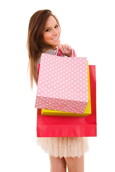 Alışveriş torbaları, üzerinde beyaz izole olan güzel kadın — Stok fotoğraf