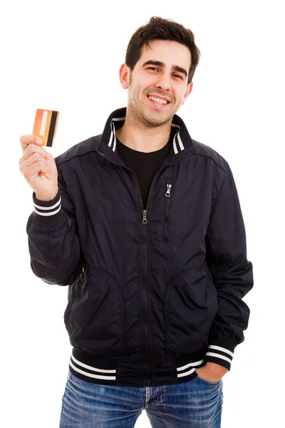 Jonge man met credit card op witte achtergrond Stockafbeelding