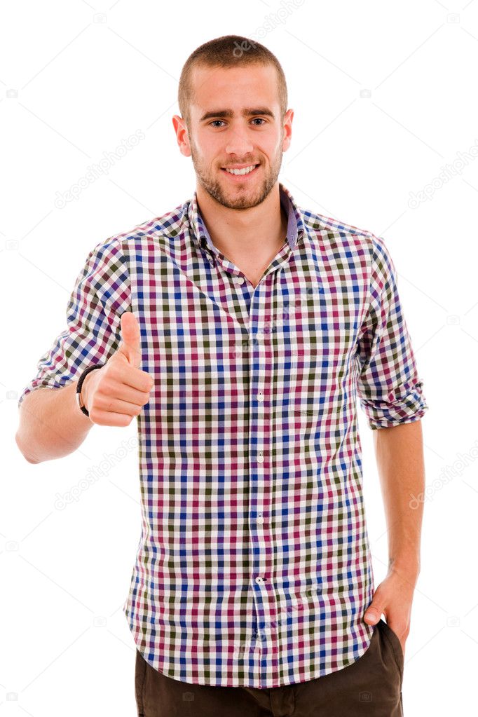 Young casual man thumb up in a white background