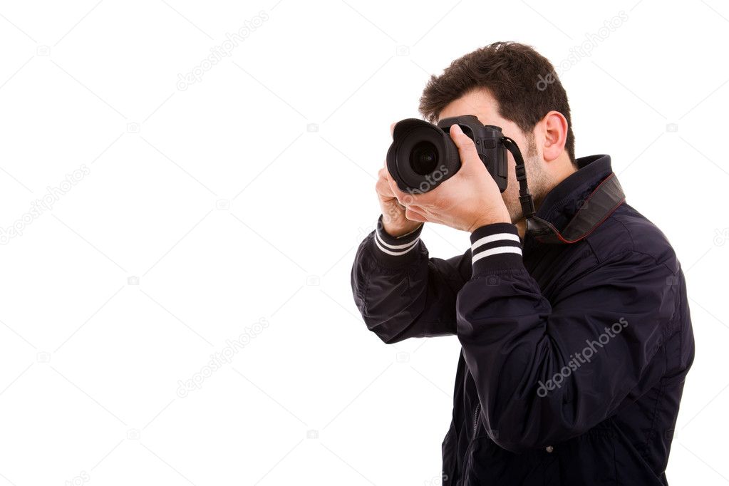 Young male photographer with camera, isolated on white