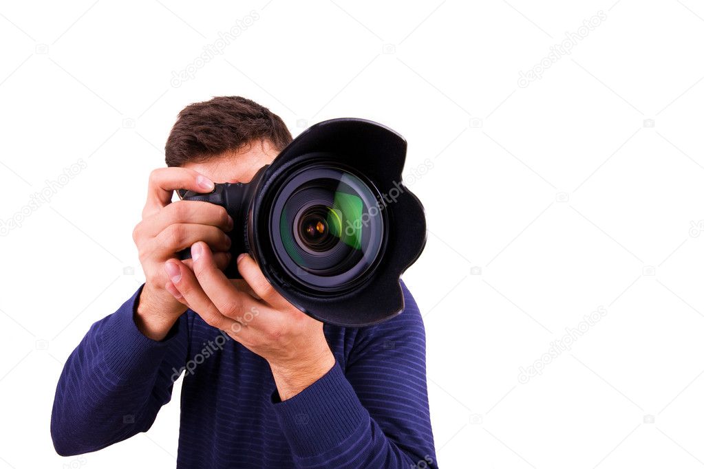 Professional photographer with camera on white background