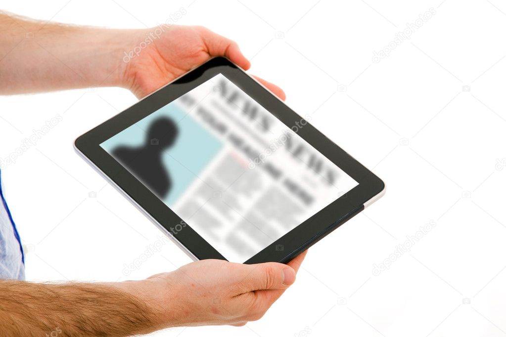 Image of man hands holding a touchpad computer and reading the n