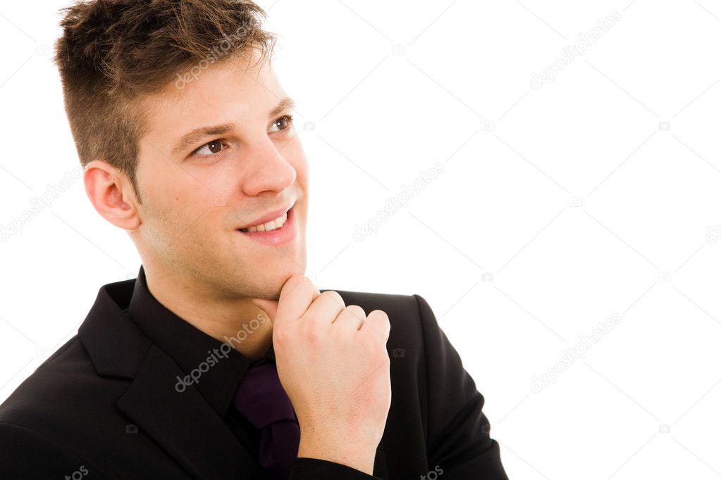 Closeup of a Pensive young business man, isolated on white