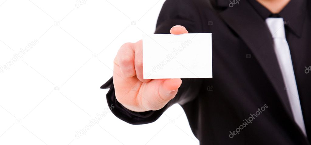 Close-up of business card in business man hand