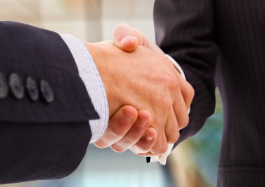 Businesspeople shaking hands clipart