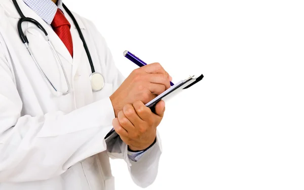 Close-up van medische arts met een stethoscoop schrijven. geïsoleerde ov — Stockfoto