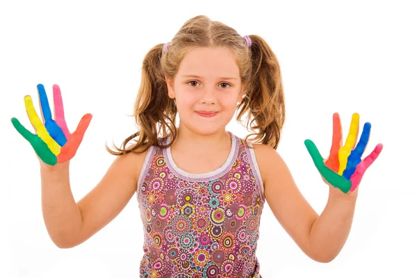Beautiful little girl showing painted hands — Stock Photo, Image
