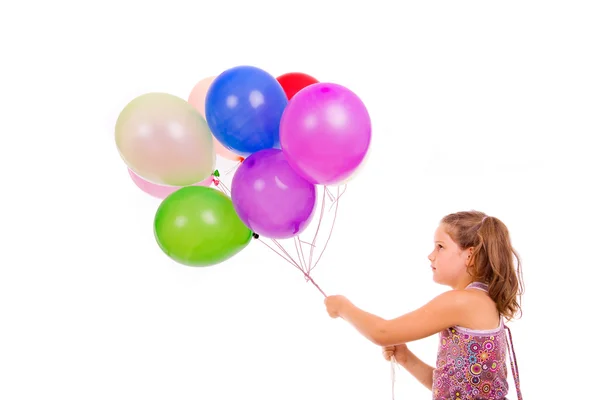 stock image Studio picture from a little girl with balloons, isolated on whi