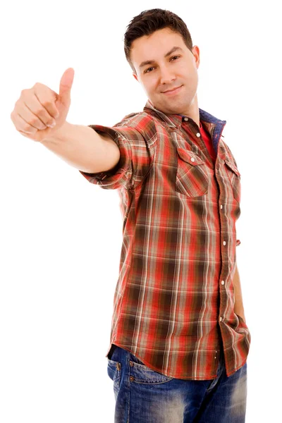 Счастливый молодой человек, показывающий большой палец и улыбающийся. Изолированные на белом — стоковое фото