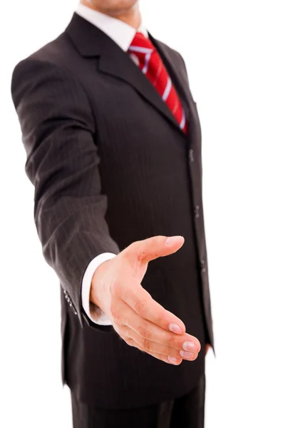 Empresário oferecendo um aperto de mão, isolado em branco — Fotografia de Stock