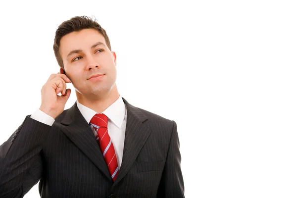 Knappe jonge zakenman aan de telefoon, geïsoleerd op wit — Stockfoto