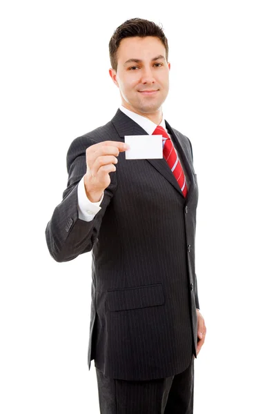 Jovem empresário oferecendo cartão de visita no fundo branco — Fotografia de Stock