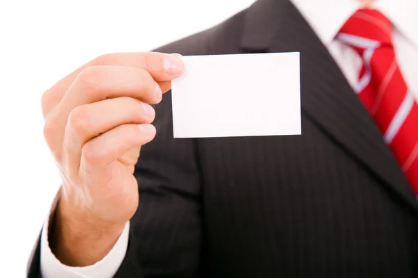 Hand des Geschäftsmannes bietet Visitenkarte auf weißem Hintergrund — Stockfoto