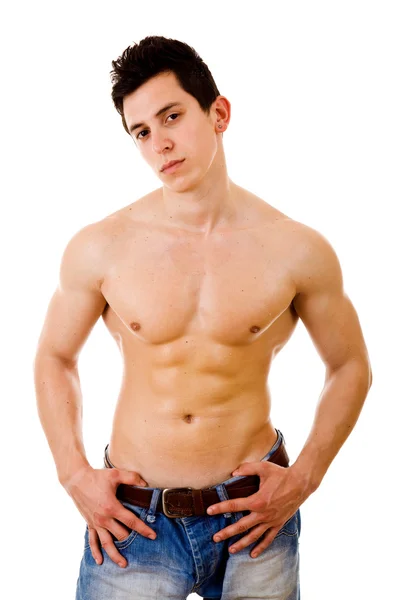 Zdravý svalnatý mladý muž. Izolováno na bílém pozadí — Stock fotografie