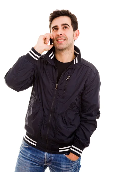 Uśmiechający się młody człowiek w telefonie, na białym tle — Zdjęcie stockowe
